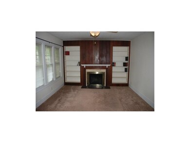Wood burning fireplace in family room