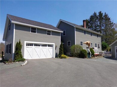 Exterior Back: The 2+ car garage...