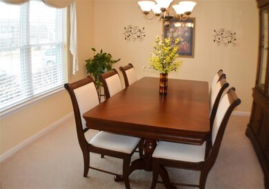 Flex room inside front door can be a dining room, an office, or anything you need!
