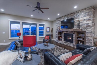 Modern oversized stone fireplace with ma