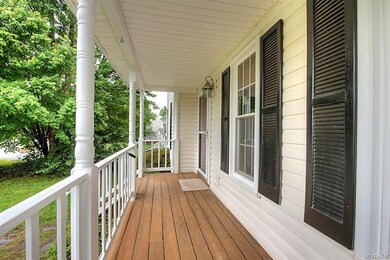 Put a couple of rocking chairs on this front porch