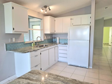 8483 Schefflera Ct, Port Saint Lucie, FL 34952 - photo 7