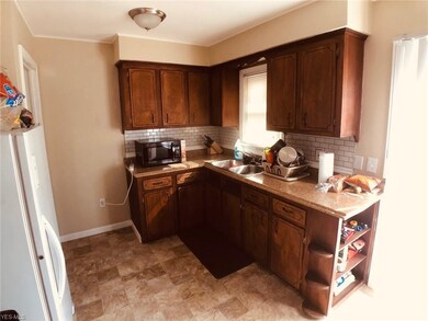 Huge eat-in kitchen with lots of cabinets and coun