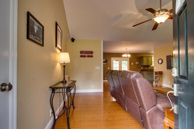 Step right into the vaulted main room - ceiling fan...