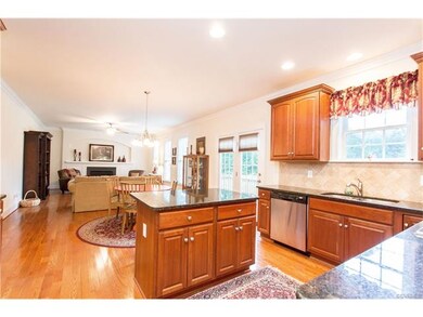 From Kitchen into Family Room -- Bright & Open!