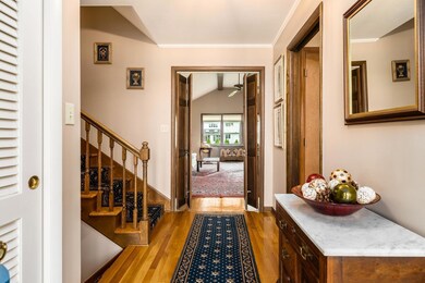 Entry with hardwood floor