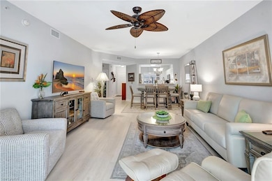 Living room featuring New light wood-style vinyl flooring, and all New Paint throughout