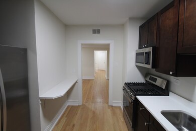 6307 N Mozart St unit 1N, Chicago, IL 60659 - photo 2