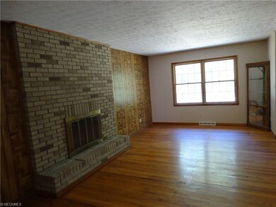 Gorgeous hardwood floors, built in corner cabinet 