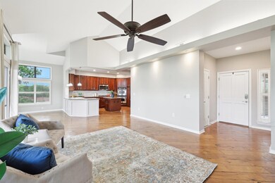 Living area with recessed lighting, baseboards, c