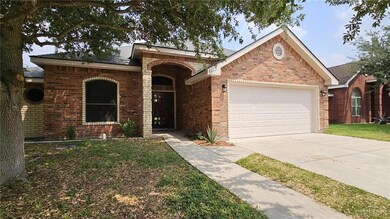 Single story home featuring a garage