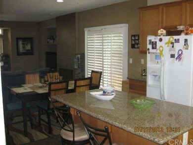 Kitchen opens to family room