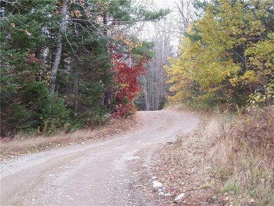 Right of Way. Gravel road dividing...