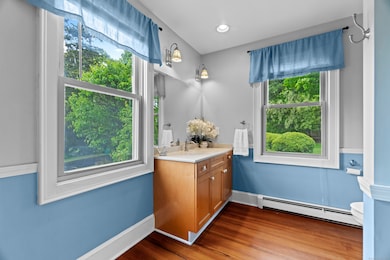 First floor full bath with hardwood floors offers a great space for your guests.