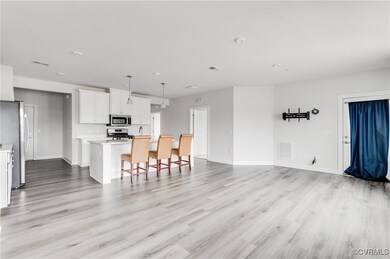 Kitchen with appliances with stainless steel finis