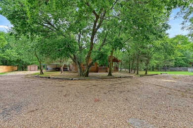 View of yard featuring a gazebo and a storage shed