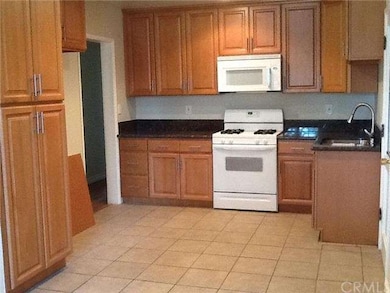Completely remodeled kitchen with new wood cabinet