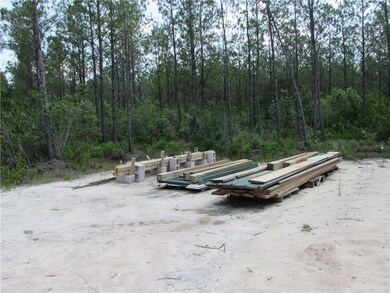 Materials on site for putting a porch/carport on t