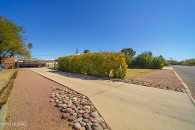Driveway to 4 car carport