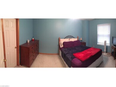 Master bedroom with walk-in closet to the left