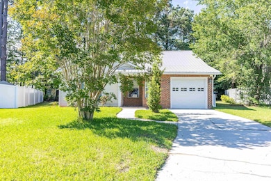 Obstructed view of property featuring a garage, dr