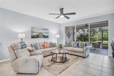 Tiled living room with ceiling fan