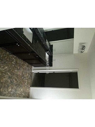 Property Photo. Master Bathroom with granite count