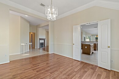 Elegant view of the spacious formal dining room, seamlessly connected to the kitchen.