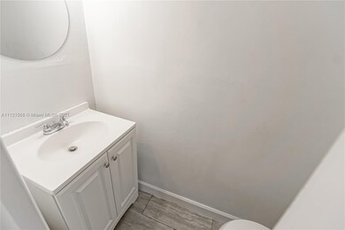 View of half bathroom. New toilet installed as wel