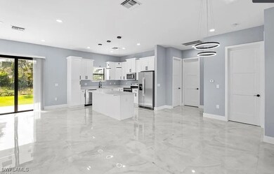 Kitchen featuring stainless steel appliances, a ki