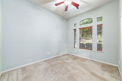 Offering quaint views of the cul de sac.