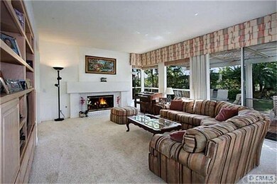 Cozy family room with built in cabinets, fireplace