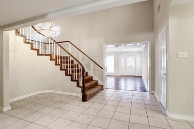 ENTRY WAY STAIRS LEADING TO THE UPSTARIS