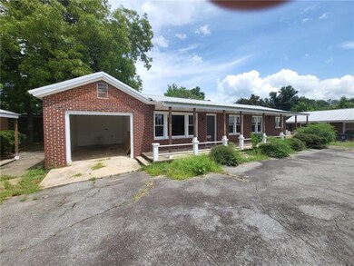 View of front of property featuring a porch and a 
