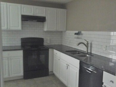Updated kitchen with built in dishwasher and stove