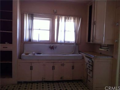 Kitchen with large cast iron sink.