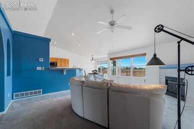 Living room open to the kitchen and breakfast nook