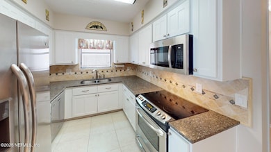 Kitchen with stainless steel appliances