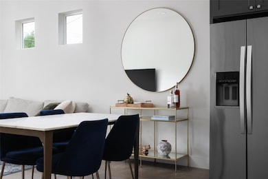 Dining room with concrete flooring