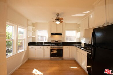 1671 Vineyard Ave, Los Angeles, CA 90019 - photo 7