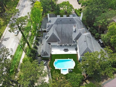 602 Hunters Court sits regally in Hunters Creek, M