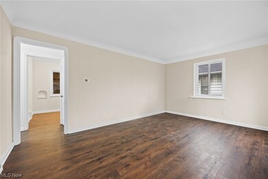 Living room featuring dark wood-type flooring