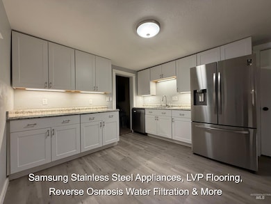 $30,000 Kitchen Remodel - New Cabinetry & Counter tops, New Under Cabinet Lighting, Samsung Stainless Steel Appliances, Built-In Microwave, New LVP Flooring, Reverse Osmosis Water Filtration, New Baseboards, New Garbage Disposal, Freshly Painted & More.