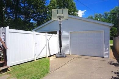 Nice maintenance free fence surrounds the bigger p