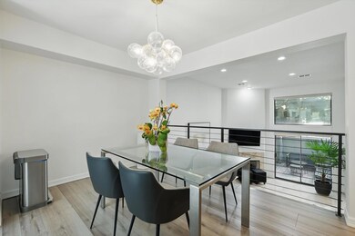 Dining room with recessed lighting, baseboards, an