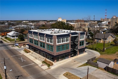 Birds eye view of property featuring a city view