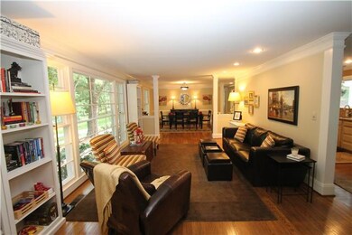 FOYER VIEW TO LIVING ROOM AND DINING ROOM