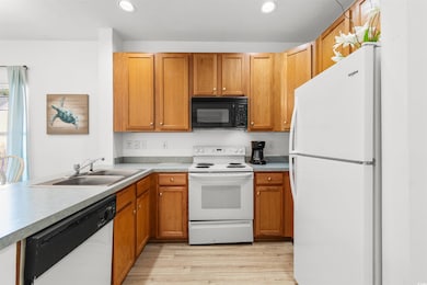Kitchen featuring light hardwood / wood-style floo