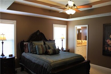 Master Bedroom with trey ceilings, double windows 