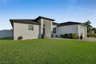 View of front of property with a front yard and a